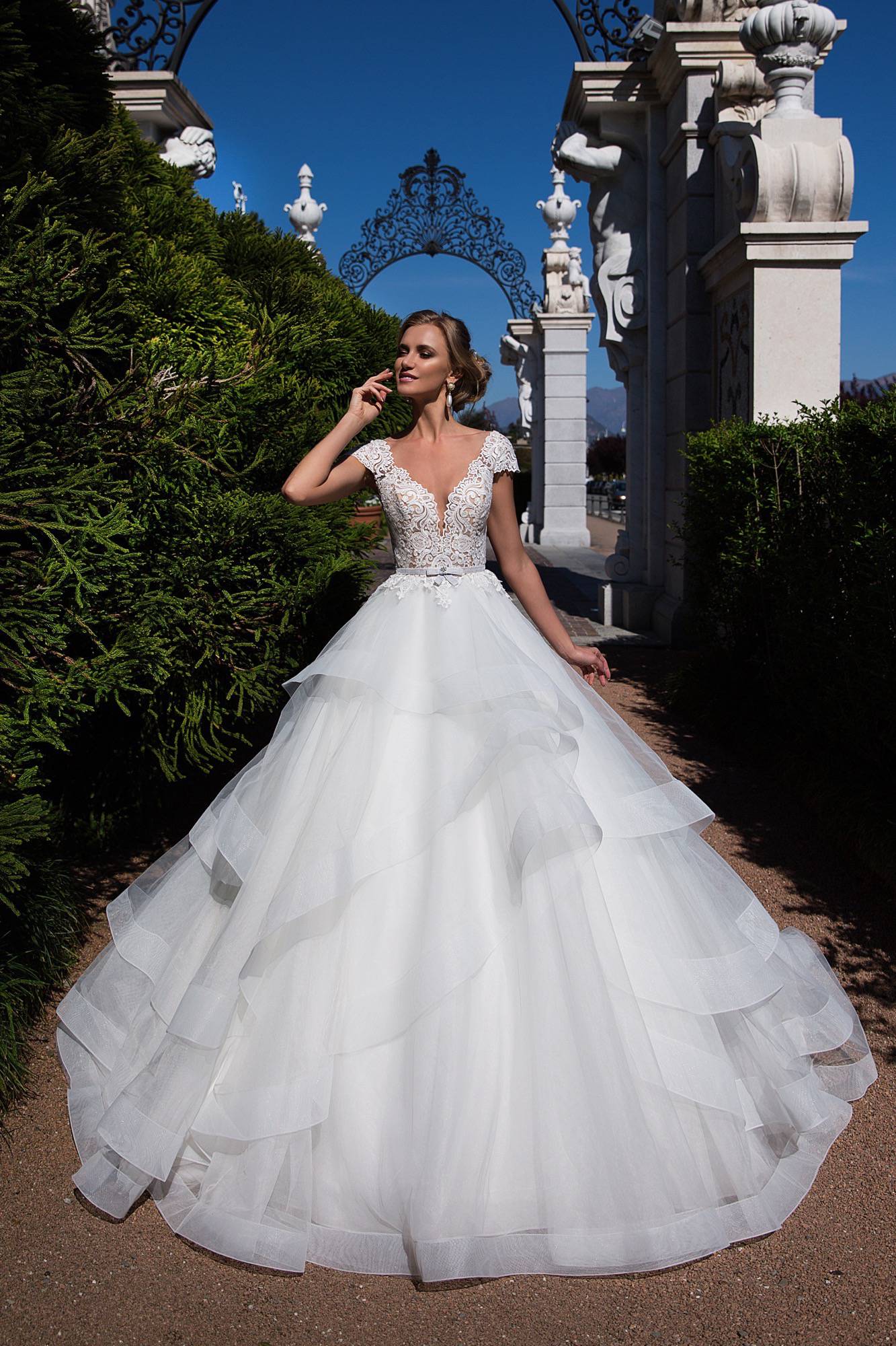 Dior 17030 wedding dress by Lussano. Shop online schedule a fitting at Ana Koi Bridal